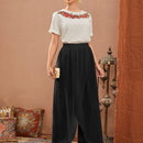 Pantalones de cintura elastica bajo tulipan