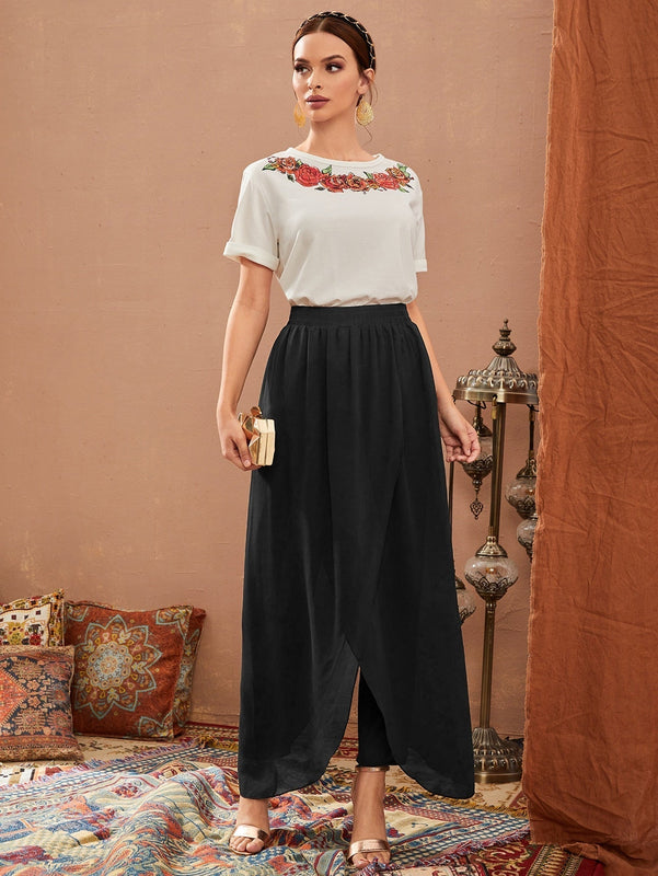 Pantalones de cintura elastica bajo tulipan