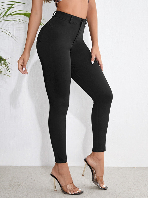 Essnce Pantalones ajustados de cintura alta