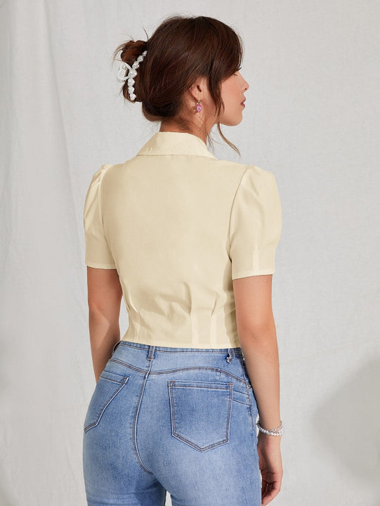 MOD Blusa de cuello con solapa de manga farol con boton