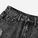 Shorts en mezclilla bajo crudo desgarro