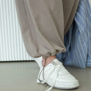 DAZY Pantalones Tapered Con Bolsillos Inclinados Y Cintura Ajustable Con Cordon