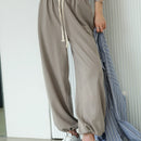 DAZY Pantalones Tapered Con Bolsillos Inclinados Y Cintura Ajustable Con Cordon
