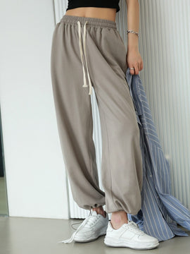 DAZY Pantalones Tapered Con Bolsillos Inclinados Y Cintura Ajustable Con Cordon