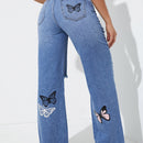 Jeans de pierna recta con estampado de mariposa desgarro