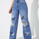 Jeans de pierna recta con estampado de mariposa desgarro