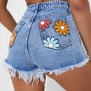 Shorts en mezclilla con estampado floral ribete sin dobladillo