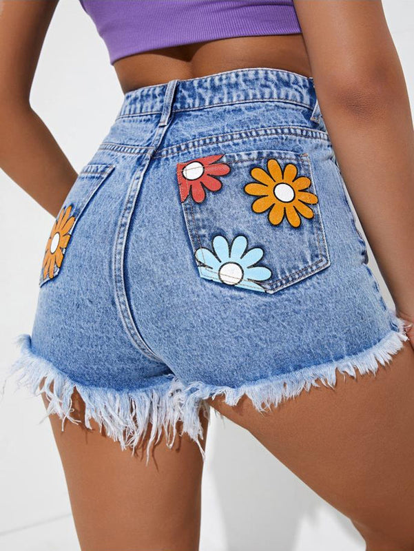 Shorts en mezclilla con estampado floral ribete sin dobladillo