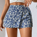 PETITE Skort floral cruzado con nudo lateral