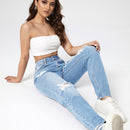 Jeans mom desgarro con lavado