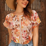 LUNE Blusa con estampado floral panel con encaje de manga murcielago