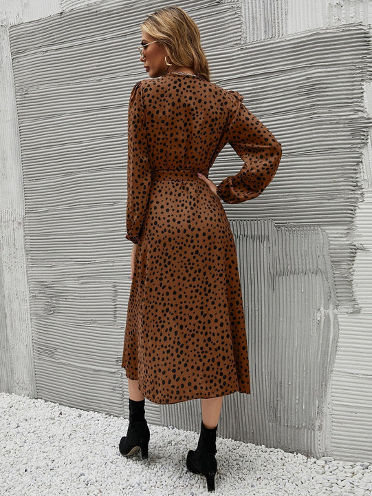 Vestido cruzado con estampado de lunares de manga farol con cordon lateral