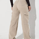 Jeans de talle alto con bolsillo lateral