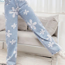Jeans de pierna recta con estampado floral