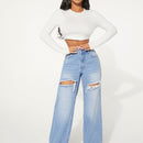 SXY Jeans con boton con abertura desgarro crudo de pierna ancha