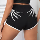SXY Shorts estampado de esqueleto unido en contraste