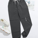 Mulvari Pantalones zanahoria de cintura con cordon con letra con bordado