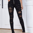 Jeans ajustados desgarro con cuenta de perla