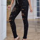 Jeans ajustados desgarro con cuenta de perla