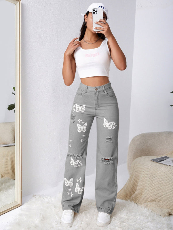 Jeans con lavado con diseno de desgarro con mariposa