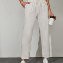 Pantalones unicolor con bolsillo oblicuo de cintura con cordon