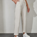 Pantalones unicolor con bolsillo oblicuo de cintura con cordon