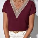 Blusa con encaje en contraste de manga murcielago