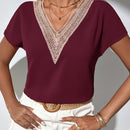 Blusa con encaje en contraste de manga murcielago