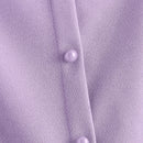 LUNE Top peplum con boton delantero con abertura laser ribete en abanico