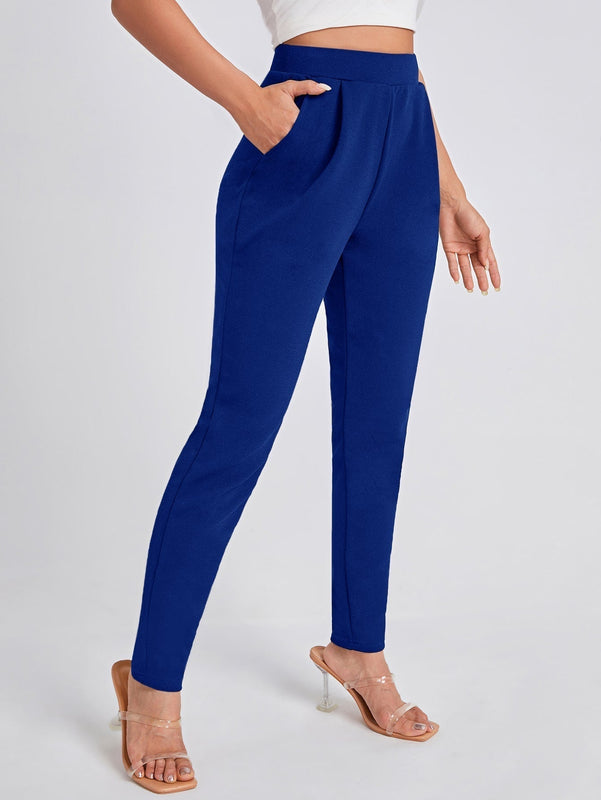 Pantalones ajustados unicolor con bolsillo oblicuo