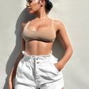 Shorts en mezclilla de cintura con volante bajo de doblez