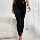 Pantalones ajustados de talle alto con diseno de boton