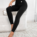 Pantalones ajustados de talle alto con diseno de boton