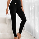 Pantalones ajustados de talle alto con diseno de boton