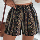 Shorts con estampado geometrico de cintura con volante con nudo delantero
