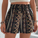 Shorts con estampado geometrico de cintura con volante con nudo delantero