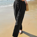 Pantalones de cintura con volante con boton con fruncido
