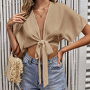 VCAY Camisa crop de manga murcielago con nudo delantero