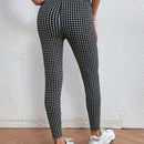 LUNE Pantalones ajustados con estampado de cuadros