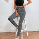 LUNE Pantalones ajustados con estampado de cuadros
