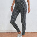 LUNE Pantalones ajustados con estampado de cuadros