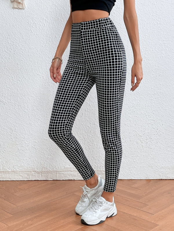 LUNE Pantalones ajustados con estampado de cuadros