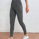 LUNE Pantalones ajustados con estampado de cuadros