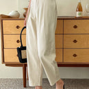 Dazy pantalones con detalles plisados solidos