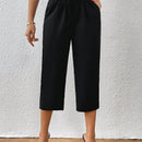 Pantalones capris unicolor con bolsillo oblicuo