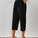 Pantalones capris unicolor con bolsillo oblicuo
