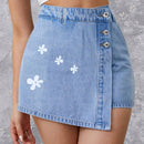 Skort mezclilla con estampado floral con boton delantero