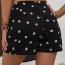 LUNE Skort con estampado floral de margarita con nudo lateral cruzado