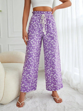 Pantalones largos con cintura con cordon y estampado floral