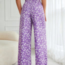 Pantalones largos con cintura con cordon y estampado floral